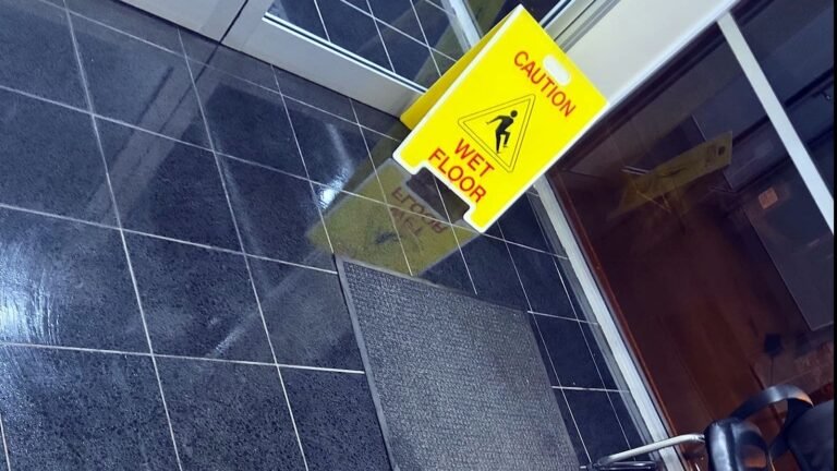 Commercial entrance tiles freshly cleaned with wet floor sign, Toowoomba